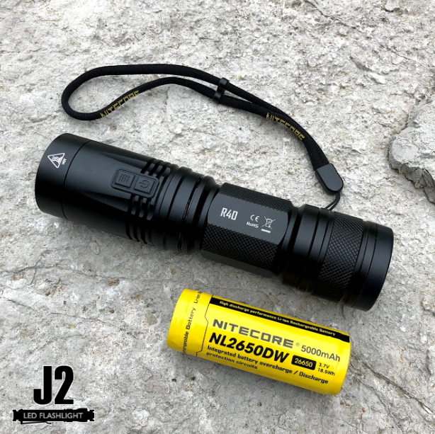 Nitecore R40 1000 Lumens Rechargeable LED Flashlight with charging dock.