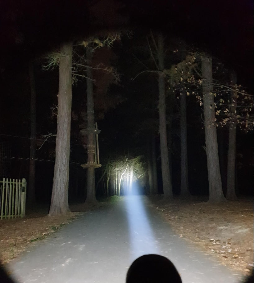 Acebeam T27 flashlight with beam shoots