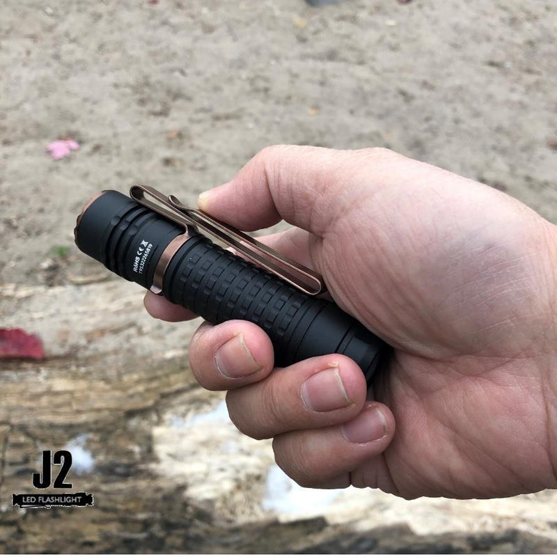 Acebeam TK18 AL tactical led flashlight in one hand